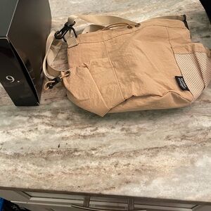 Baddies And Budgets Beige Crossbody Bag